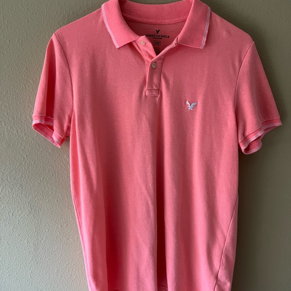 Pink polo shirt. Medium. Good condition